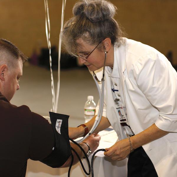 A student getting their blood pressure measured